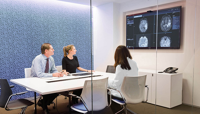 Conference room with Antenna Workspaces® Table and Storage and MultiGeneration by Knoll® with Hybrid Base Chairs